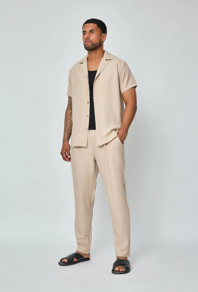 Set van overhemd met korte mouwen en broek