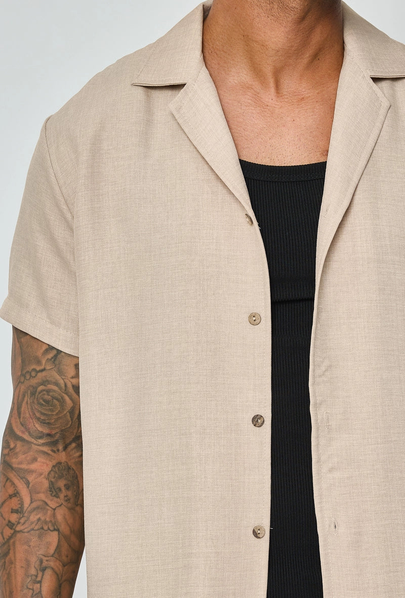 Set van overhemd met korte mouwen en broek