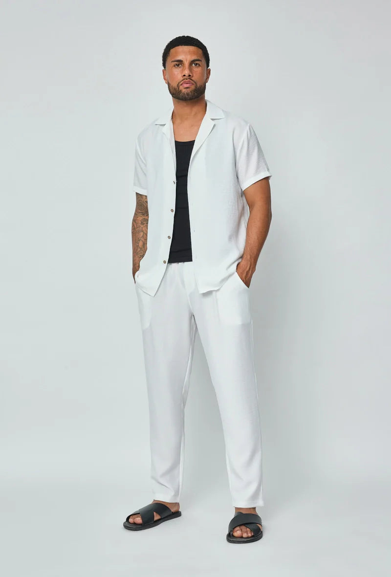 Set van overhemd met korte mouwen en broek