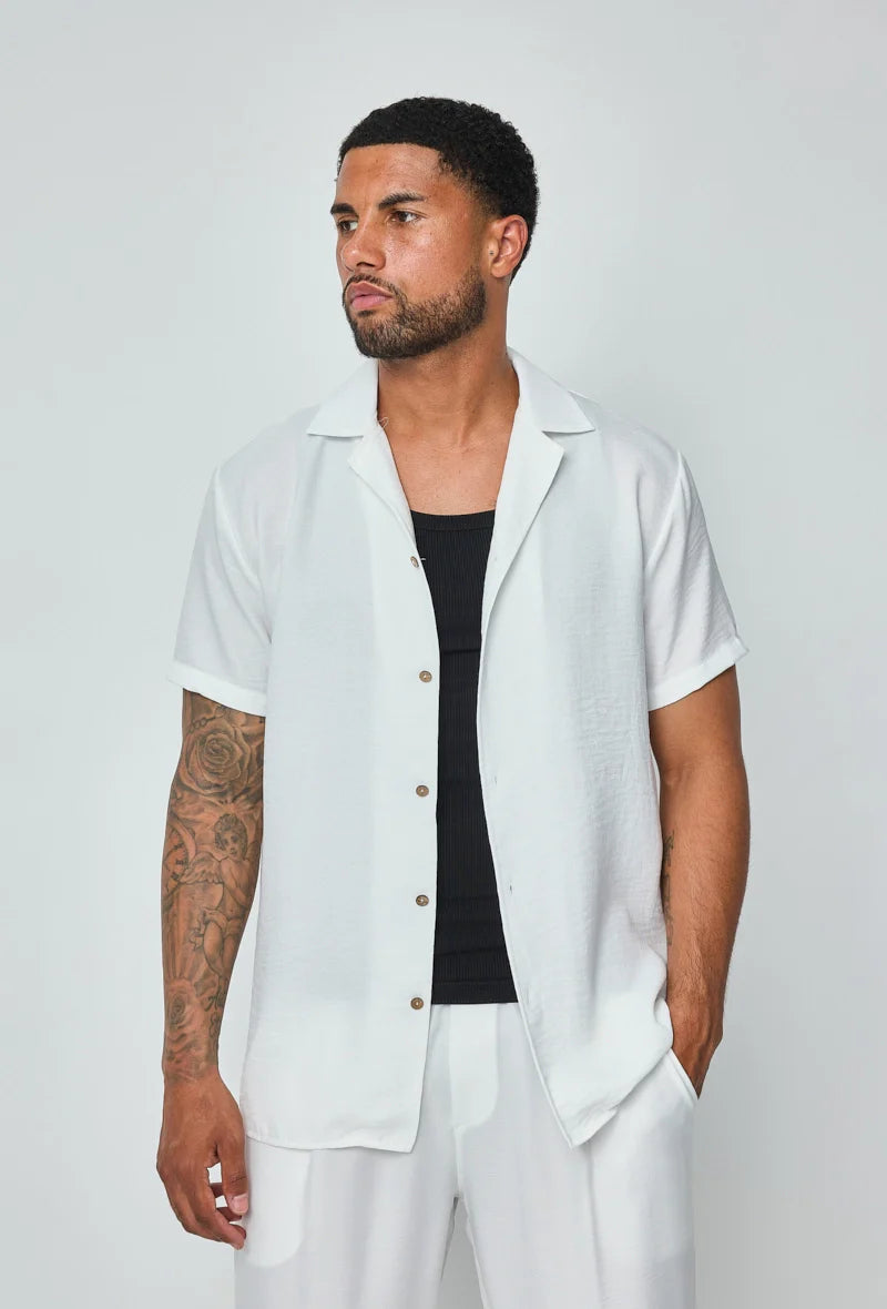 Set van overhemd met korte mouwen en broek