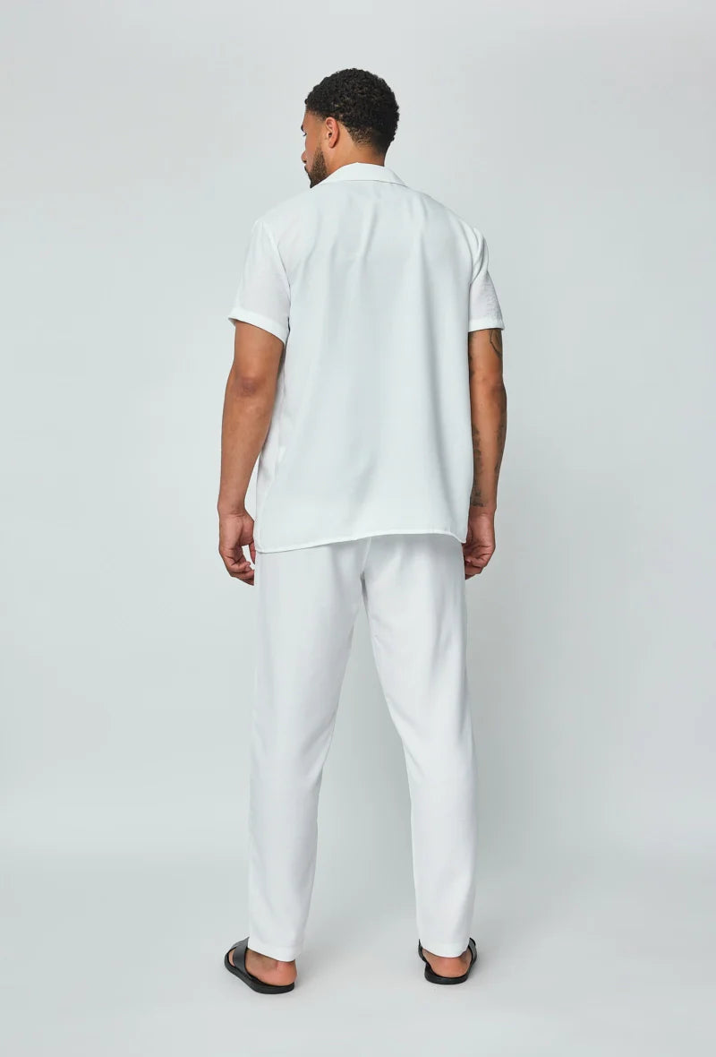 Set van overhemd met korte mouwen en broek