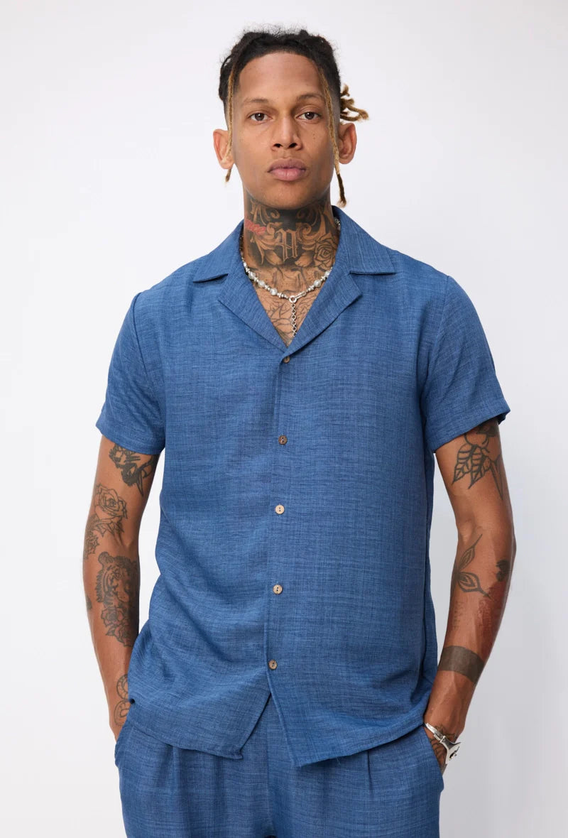 Set van overhemd met korte mouwen en broek