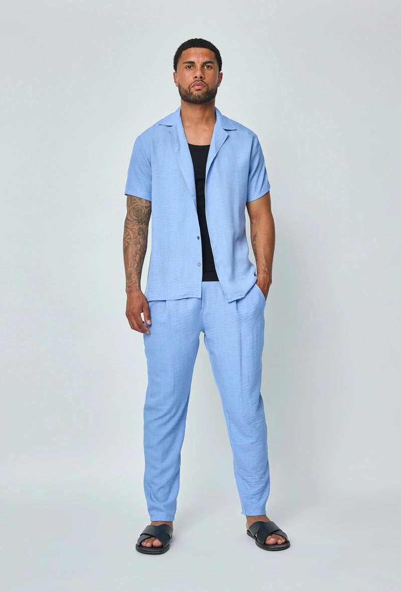 Set van overhemd met korte mouwen en broek