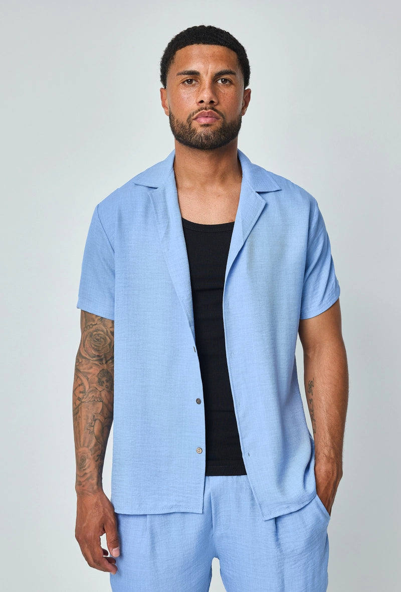 Set van overhemd met korte mouwen en broek