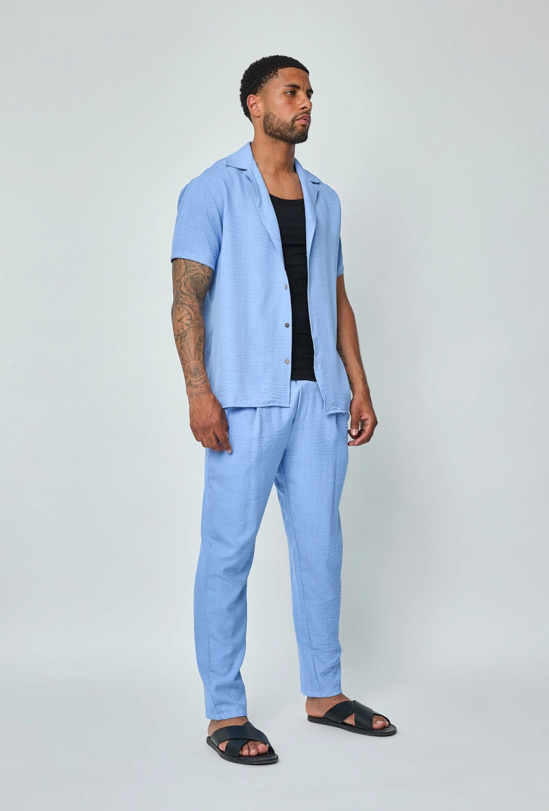 Set van overhemd met korte mouwen en broek