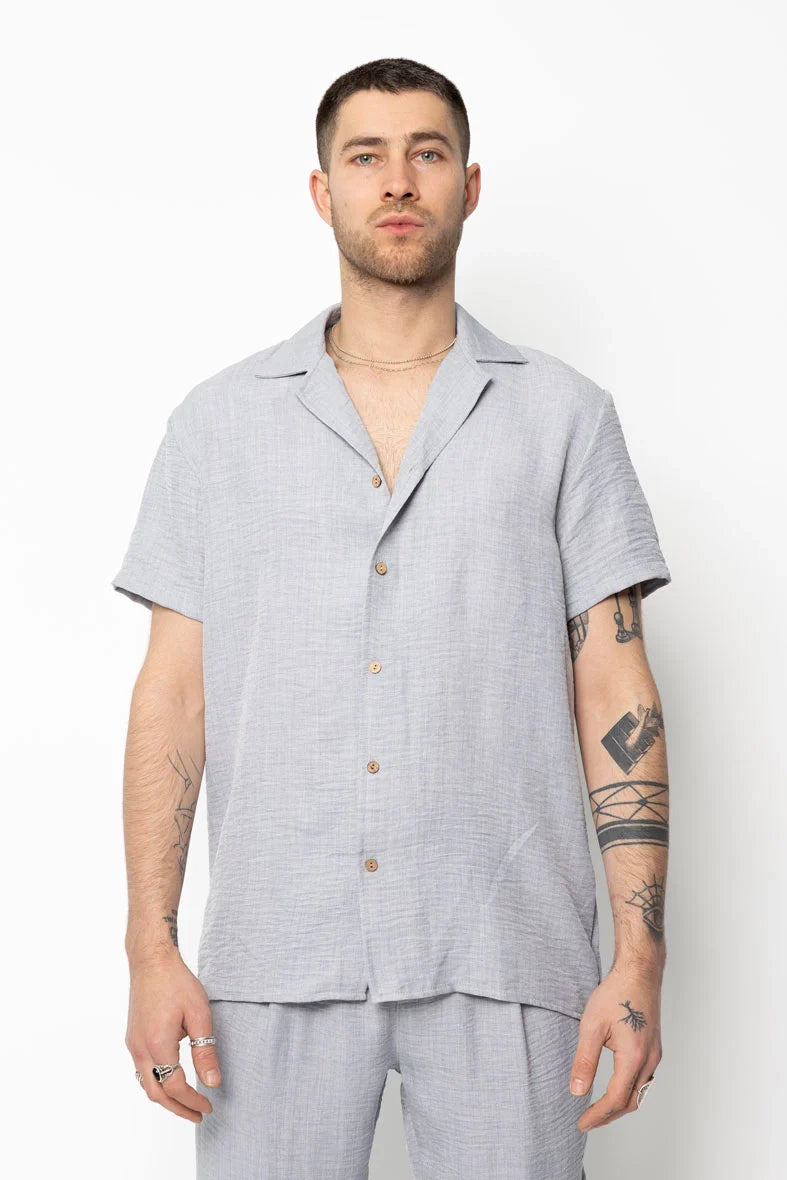 Set van overhemd met korte mouwen en broek