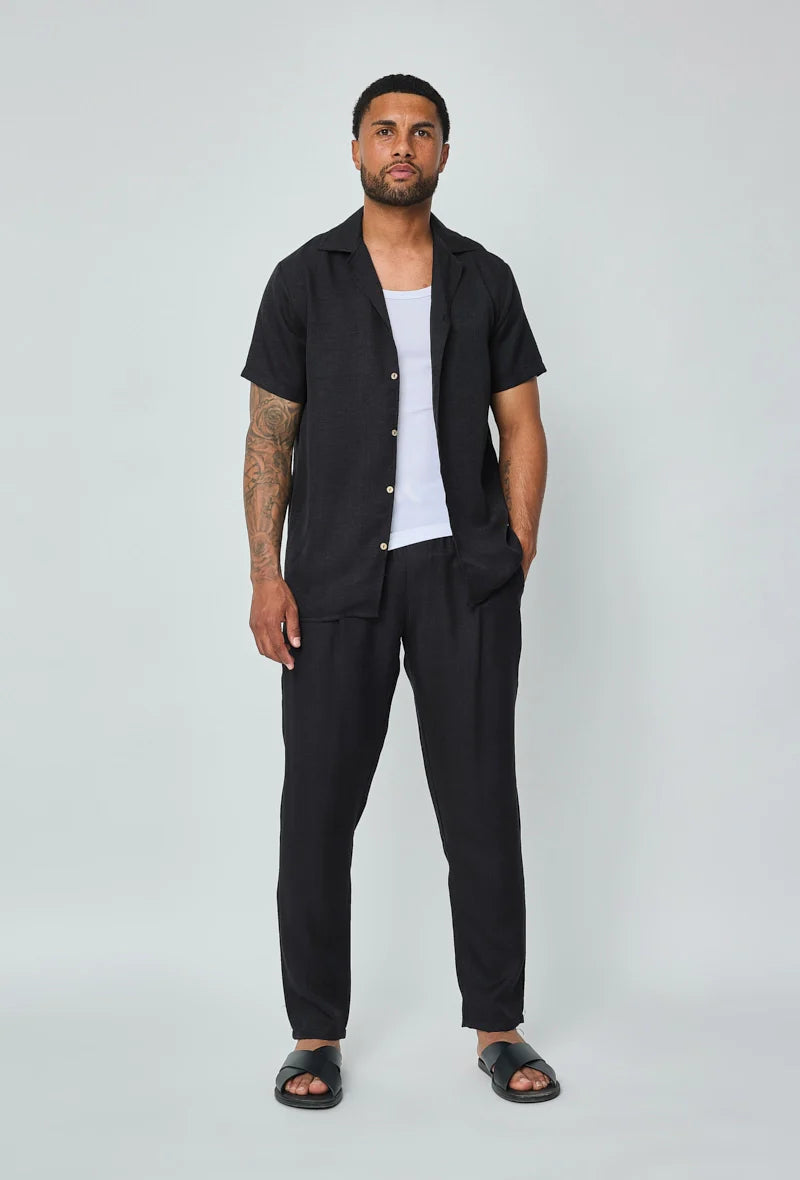 Set van overhemd met korte mouwen en broek