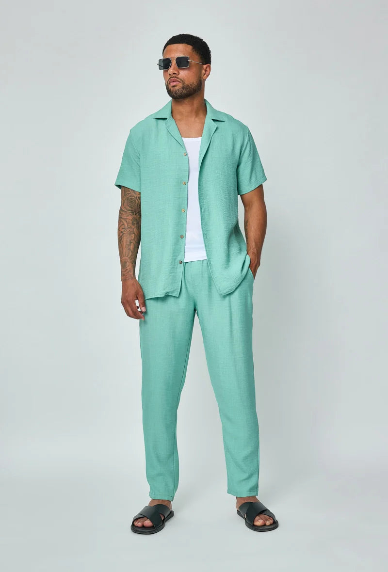 Set van overhemd met korte mouwen en broek