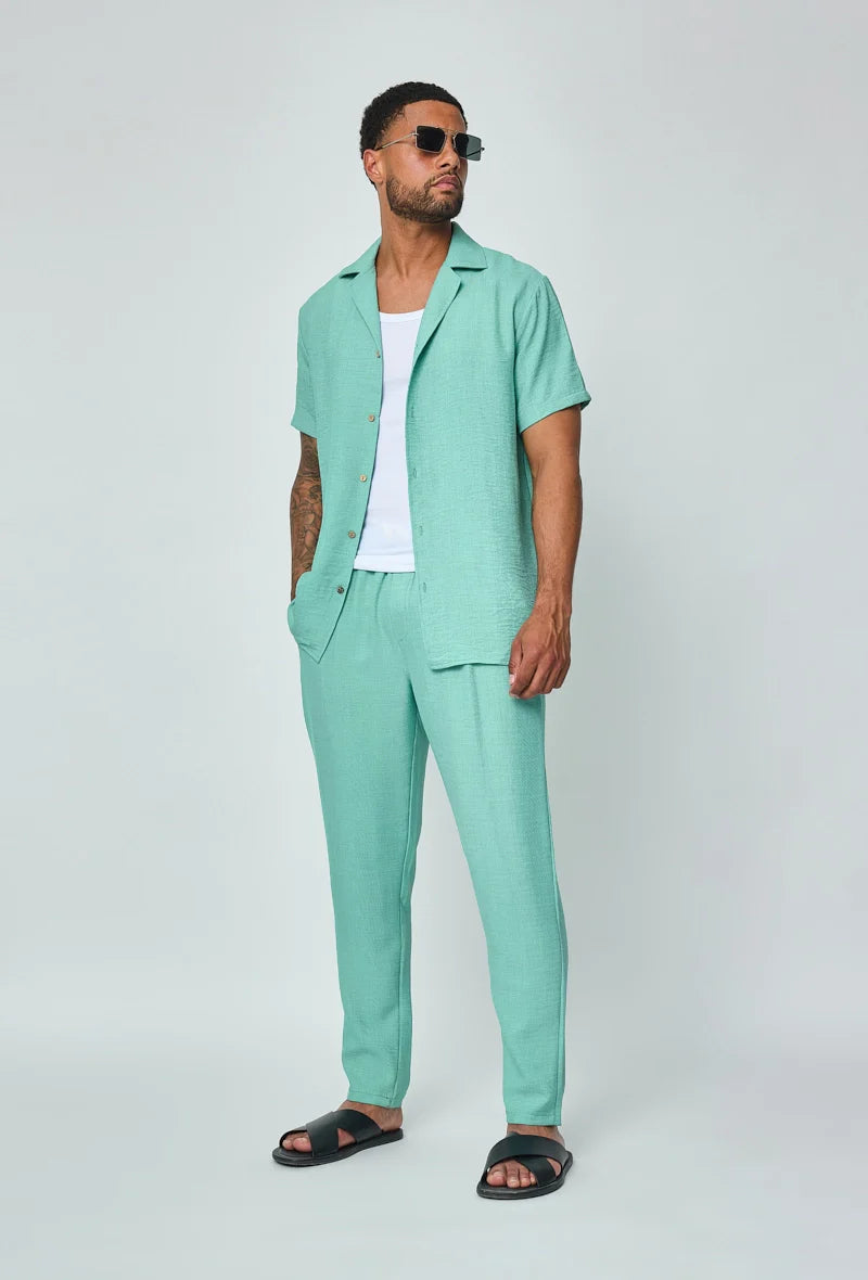 Set van overhemd met korte mouwen en broek