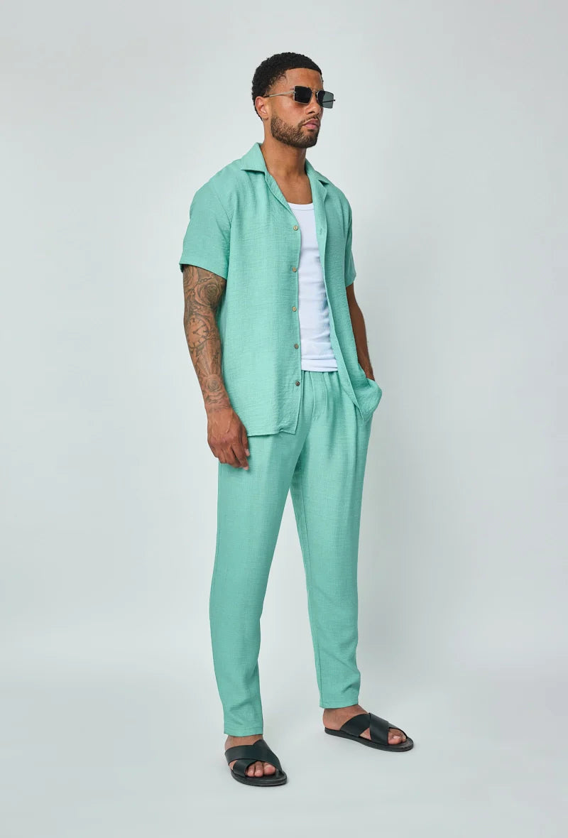 Set van overhemd met korte mouwen en broek