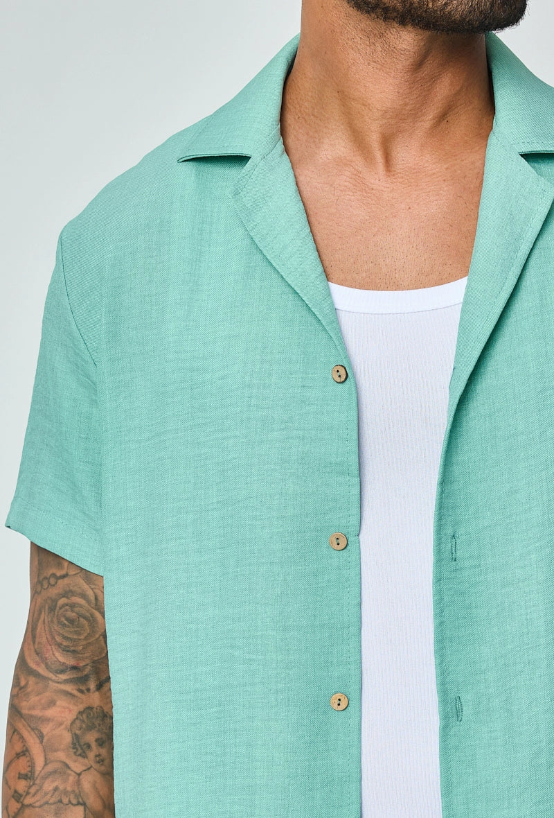 Set van overhemd met korte mouwen en broek