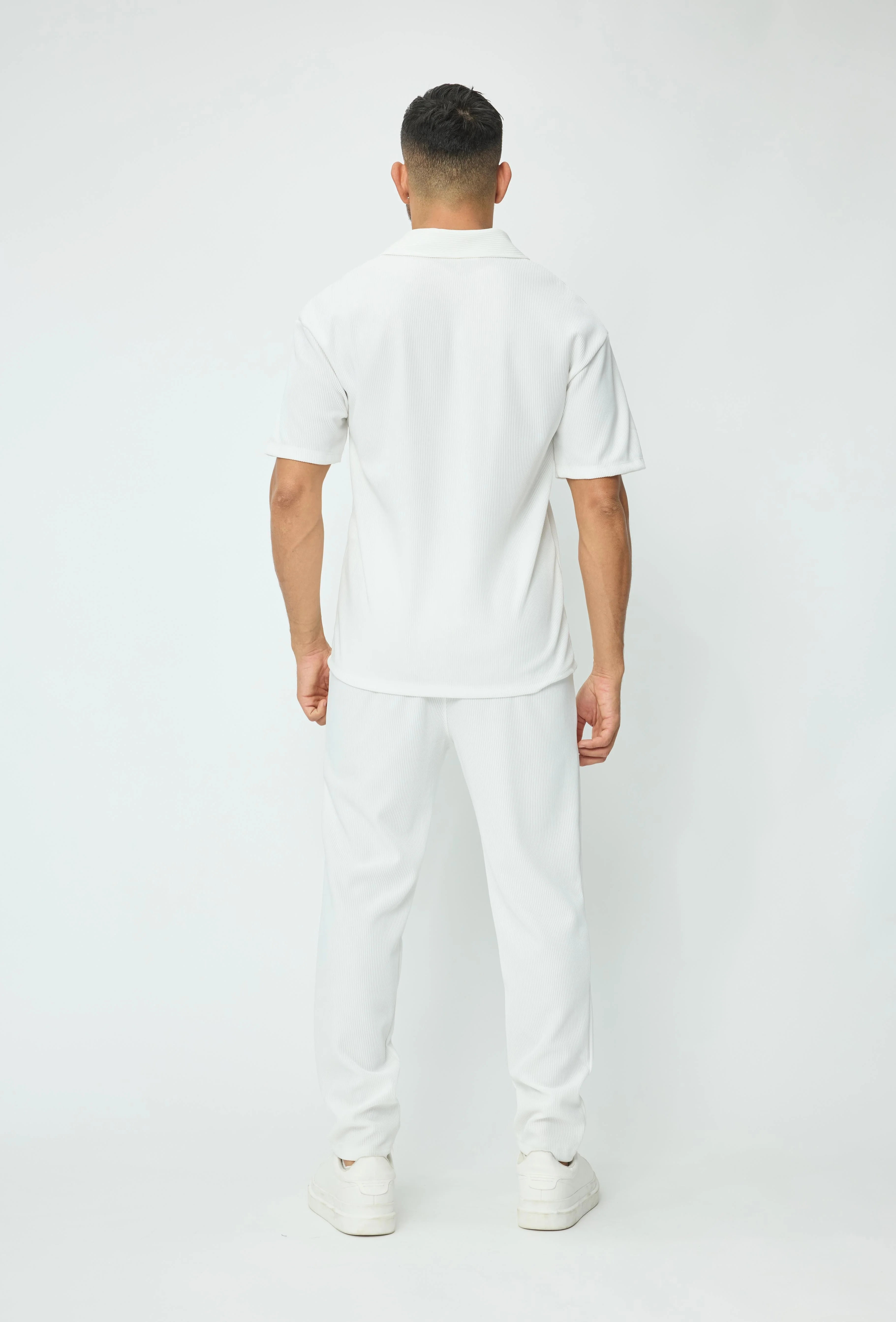 Set van geplooid T-shirt en broek