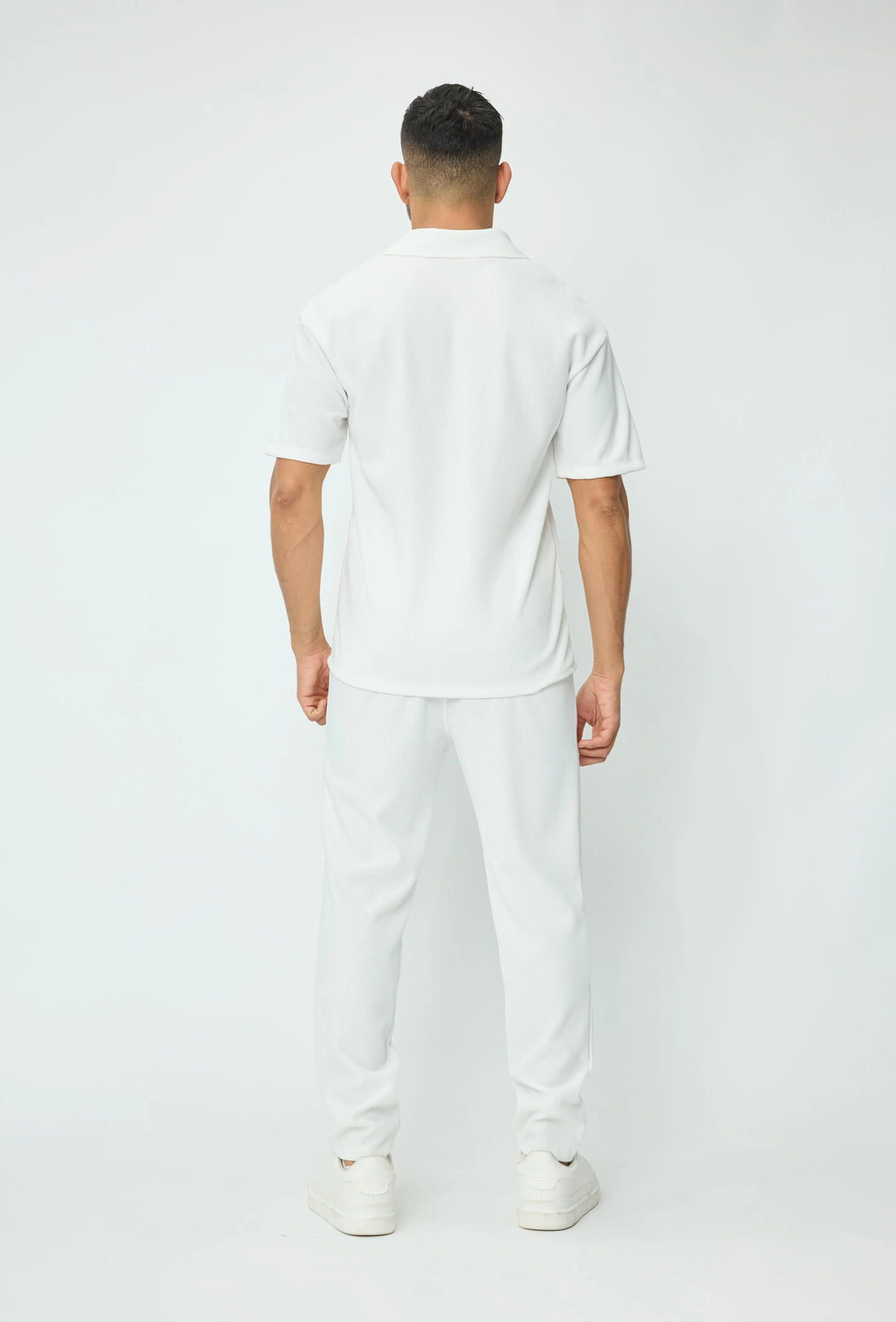 Set van geplooid T-shirt en broek