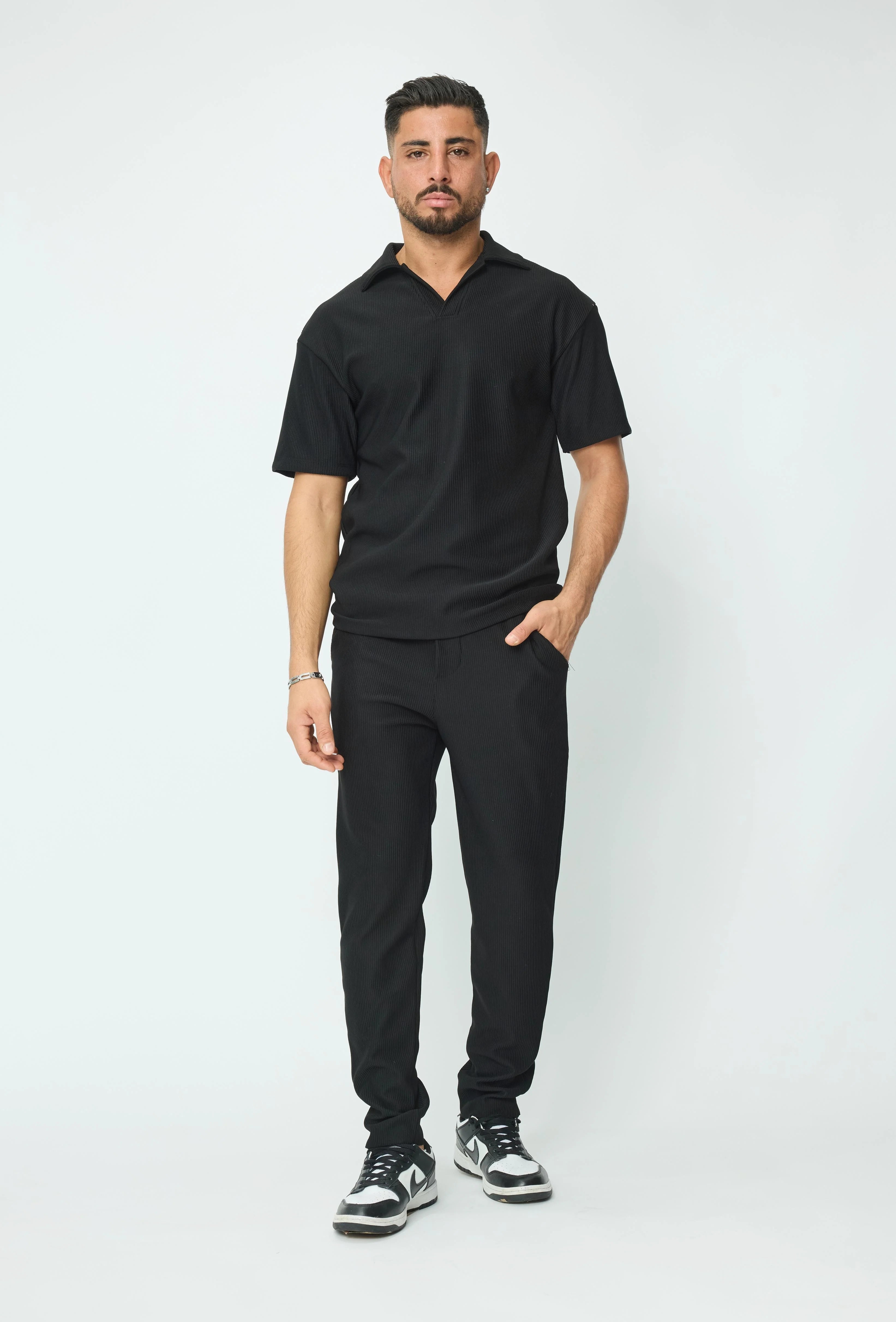 Set van geplooid T-shirt en broek