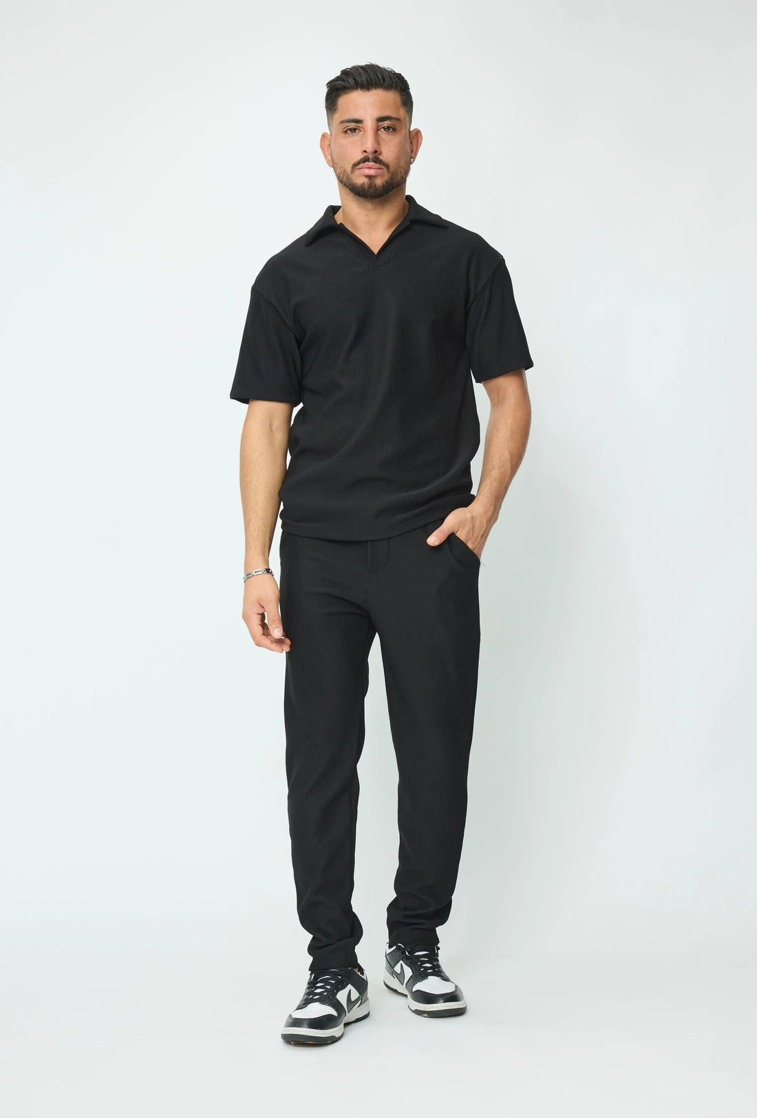 Set van geplooid T-shirt en broek