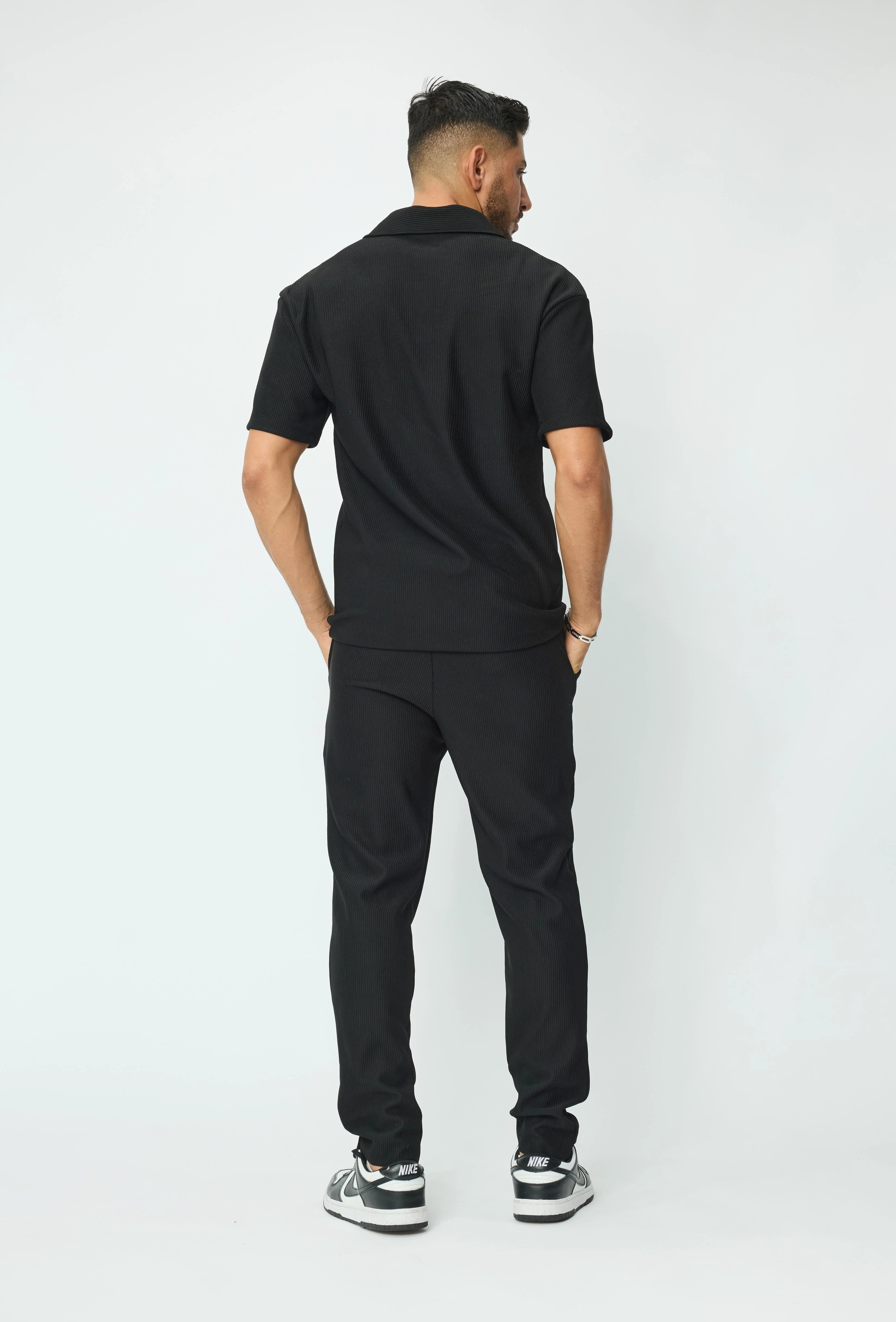 Set van geplooid T-shirt en broek