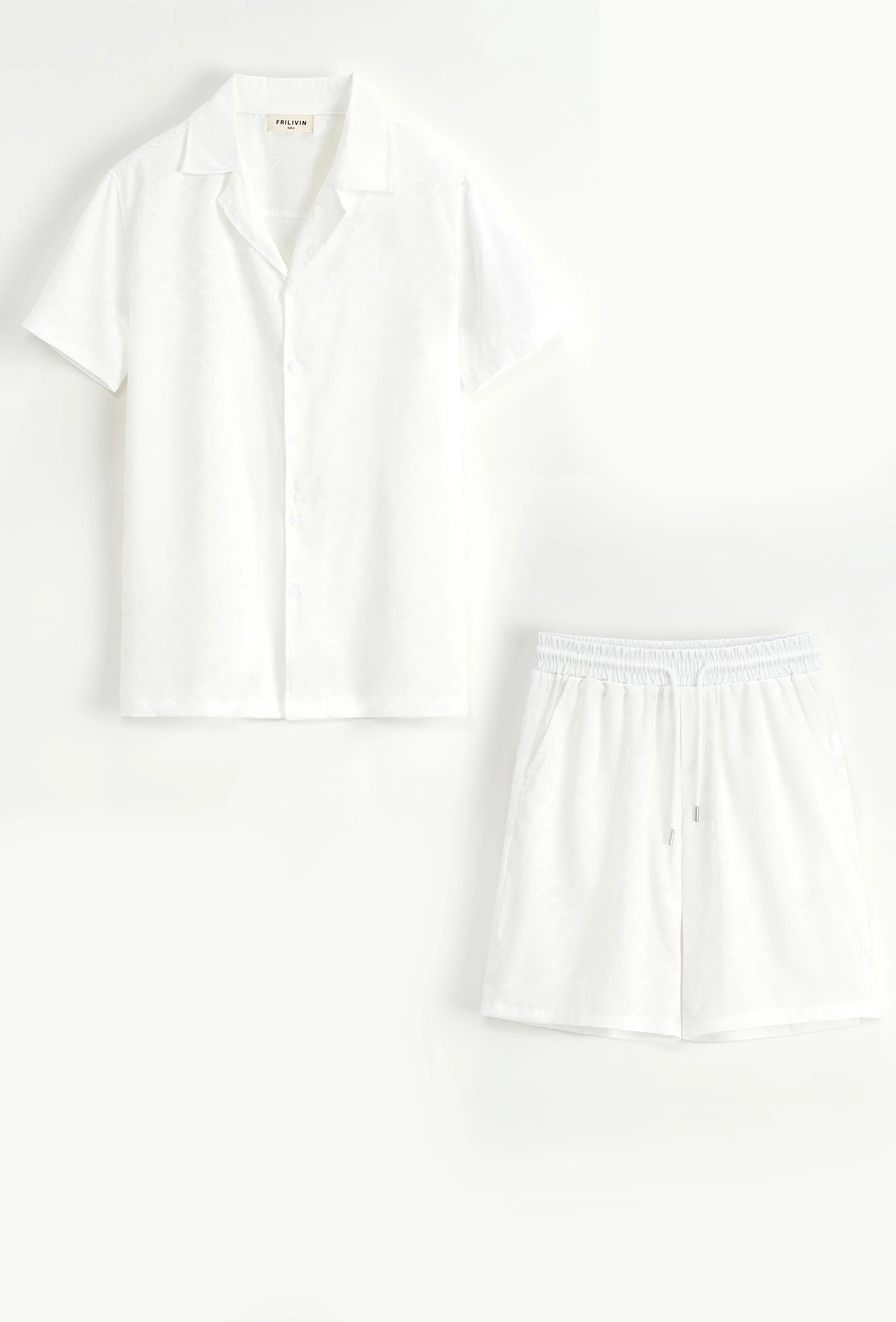 Set van effen shirt en korte broek met patroon