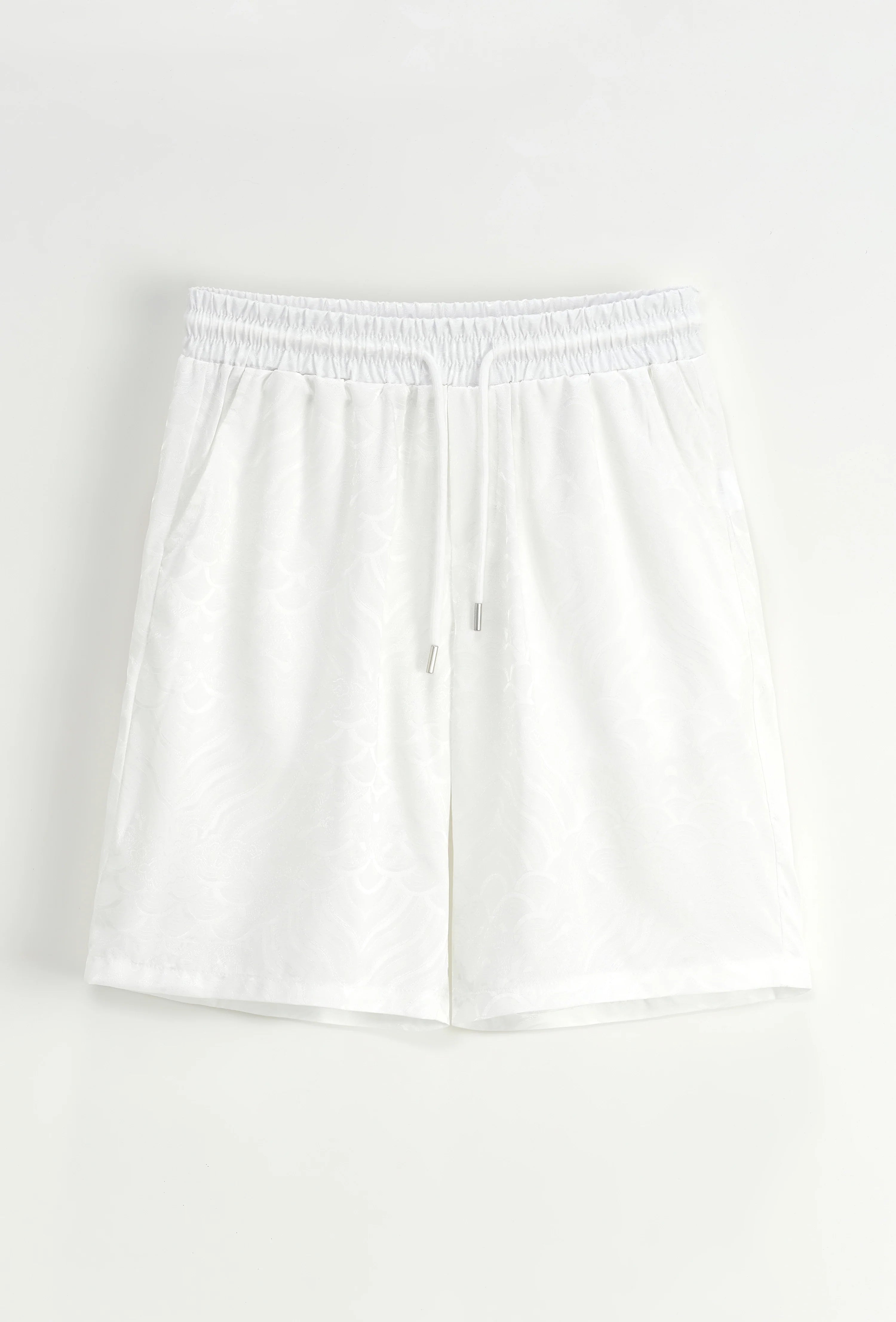 Set van effen shirt en korte broek met patroon