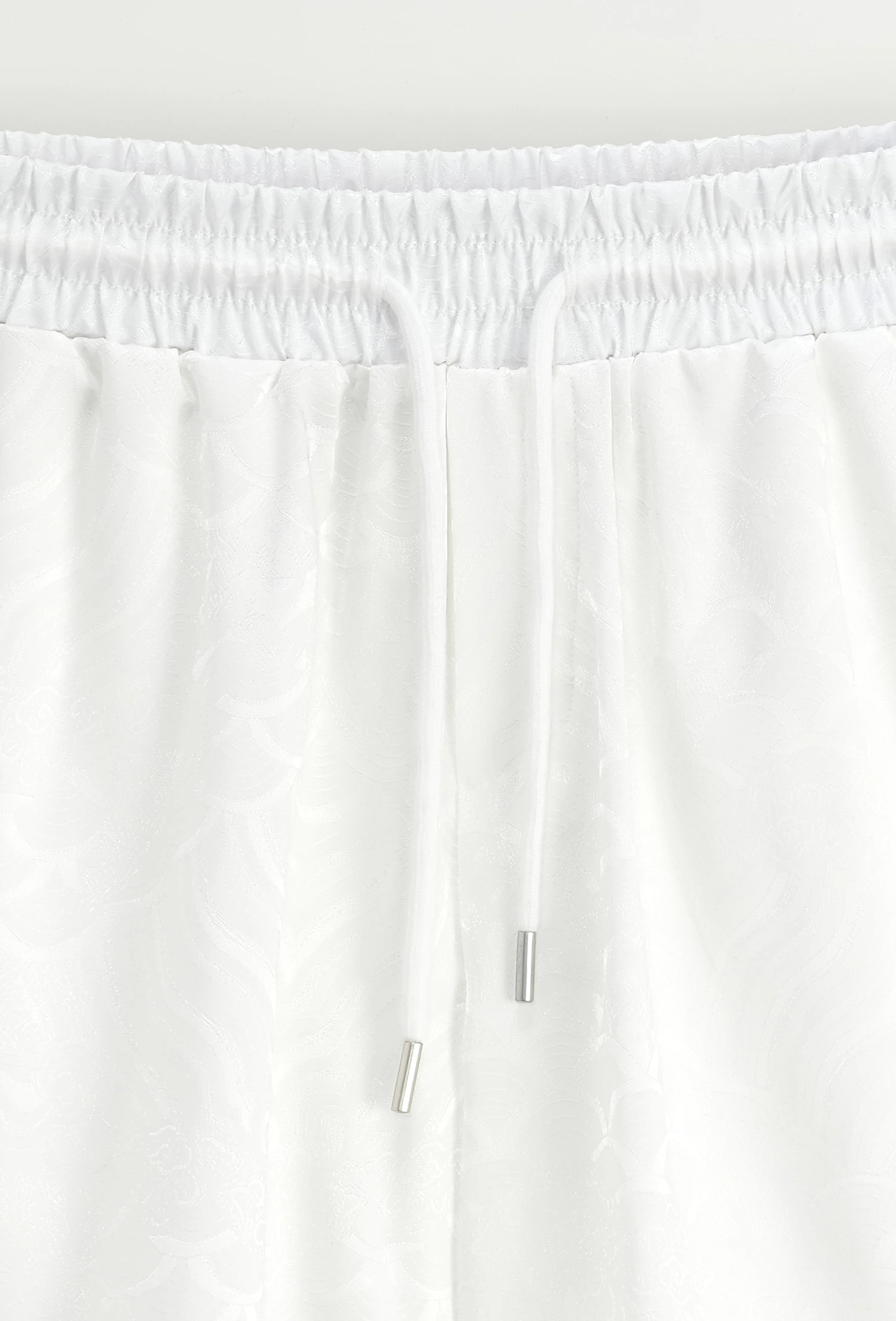 Set van effen shirt en korte broek met patroon