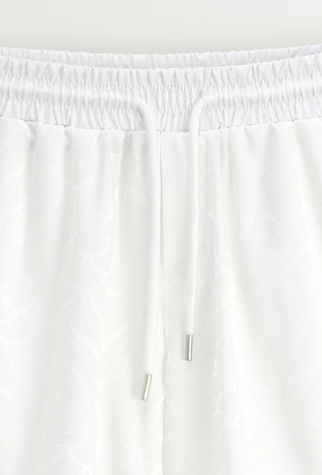 Set van effen shirt en korte broek met patroon