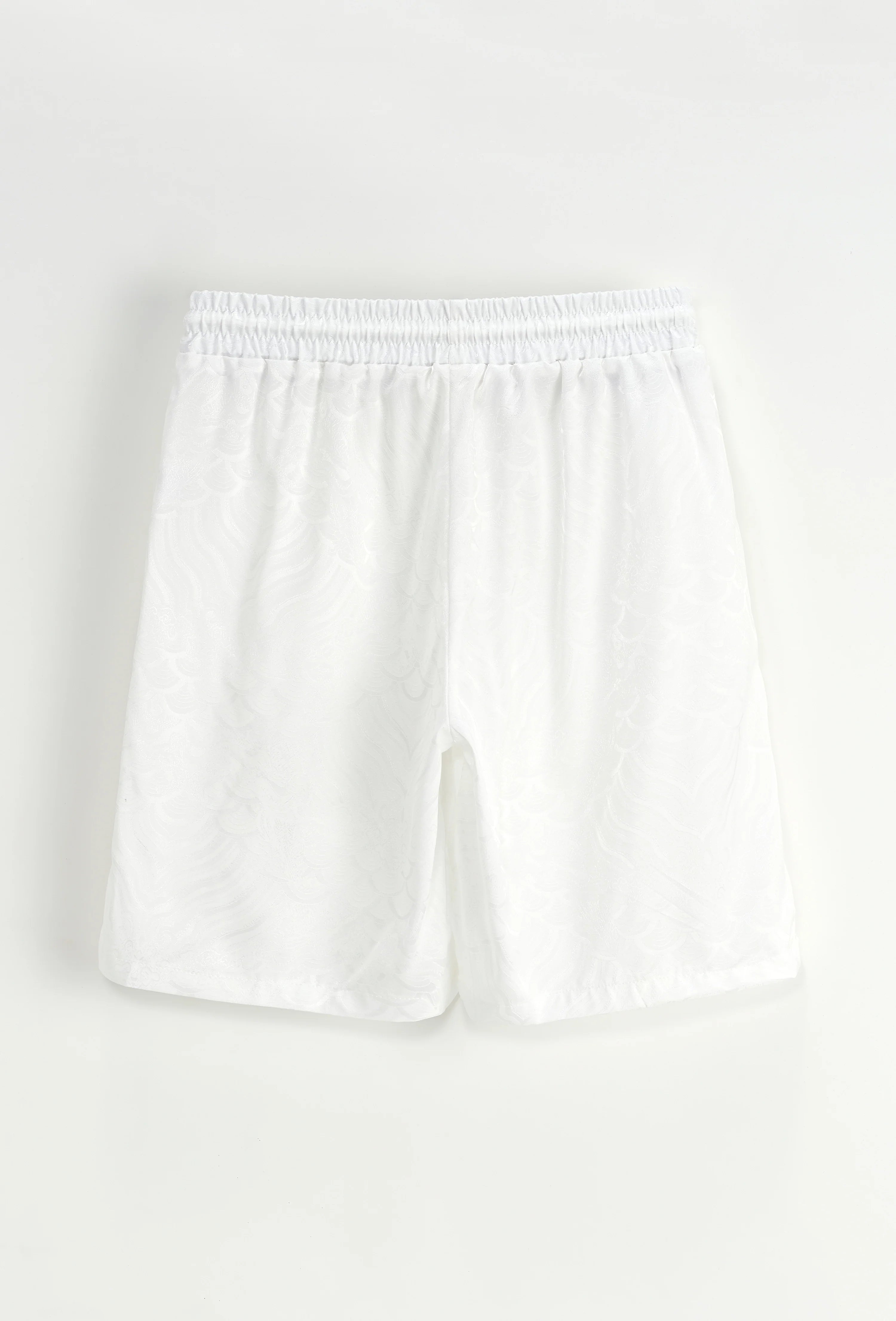 Set van effen shirt en korte broek met patroon