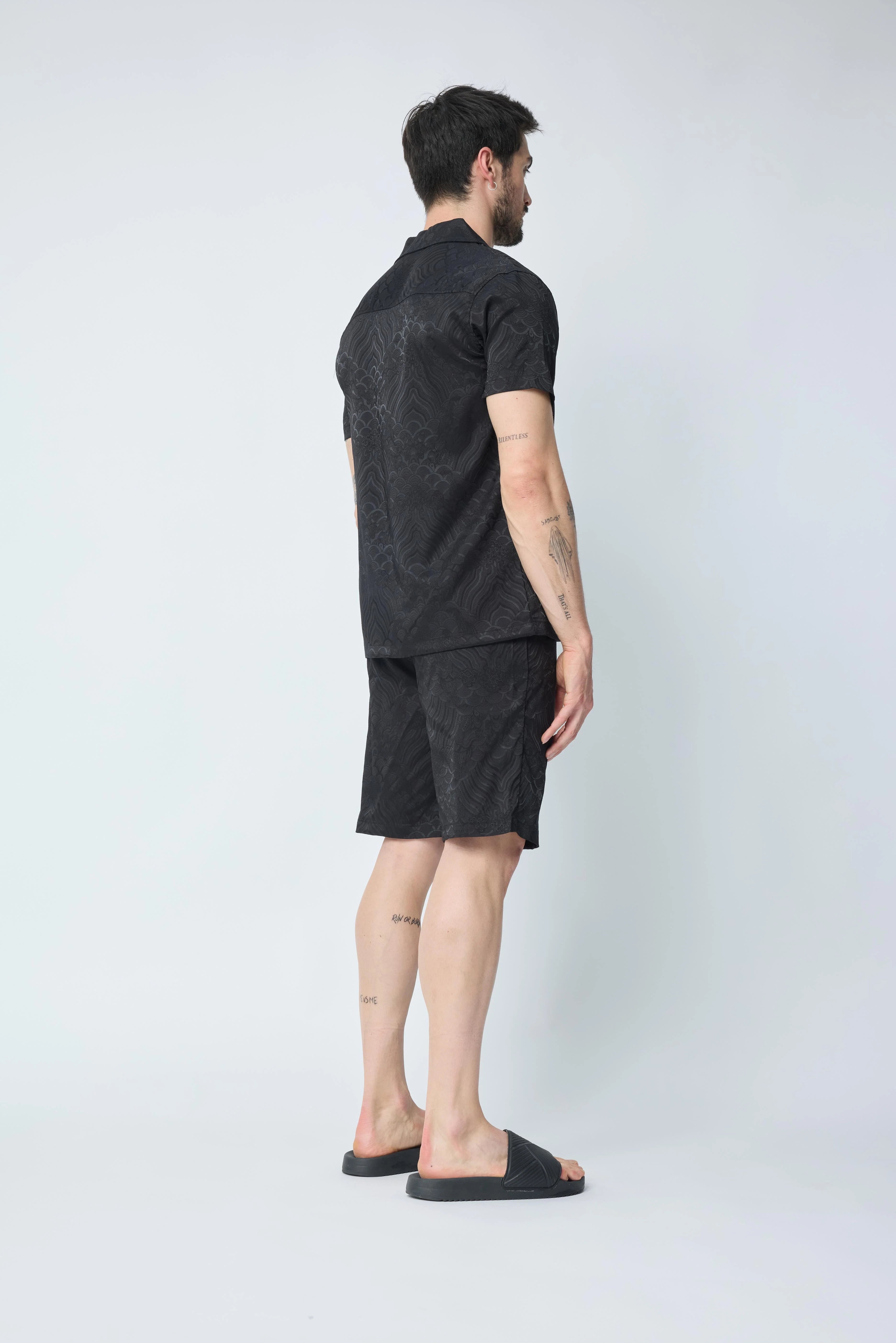 Set van effen shirt en korte broek met patroon