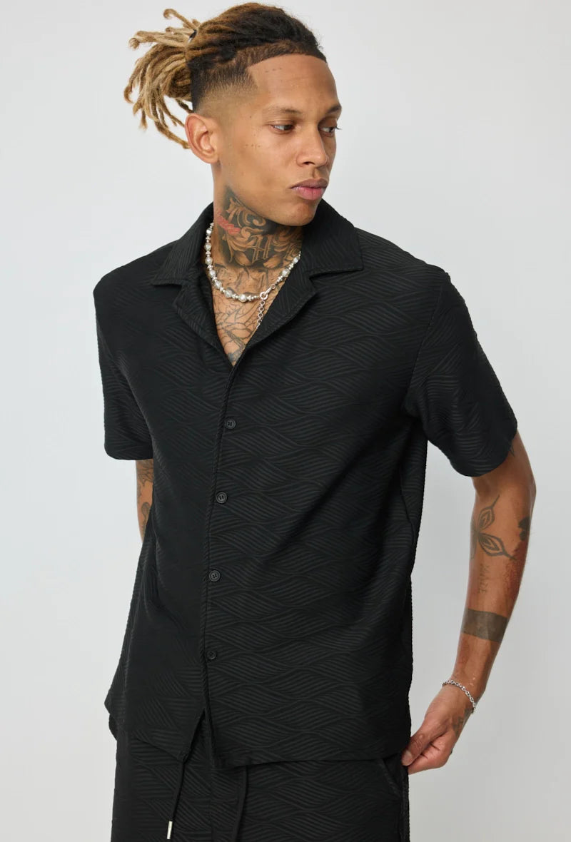 Set van effen shirt en korte broek met patroon