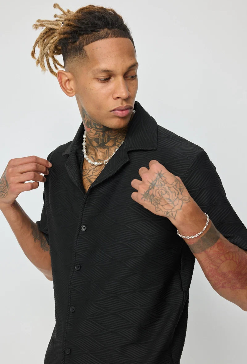 Set van effen shirt en korte broek met patroon