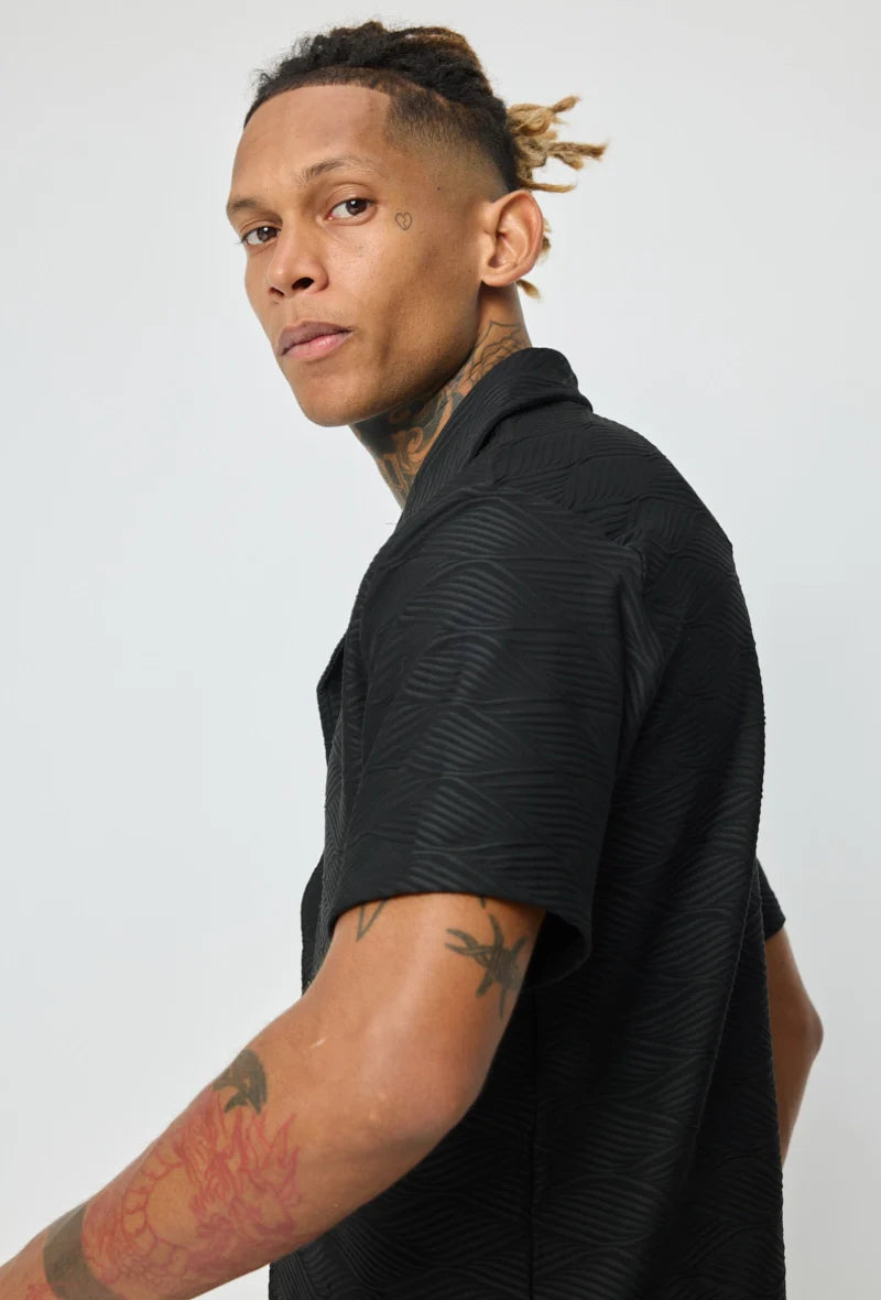 Set van effen shirt en korte broek met patroon