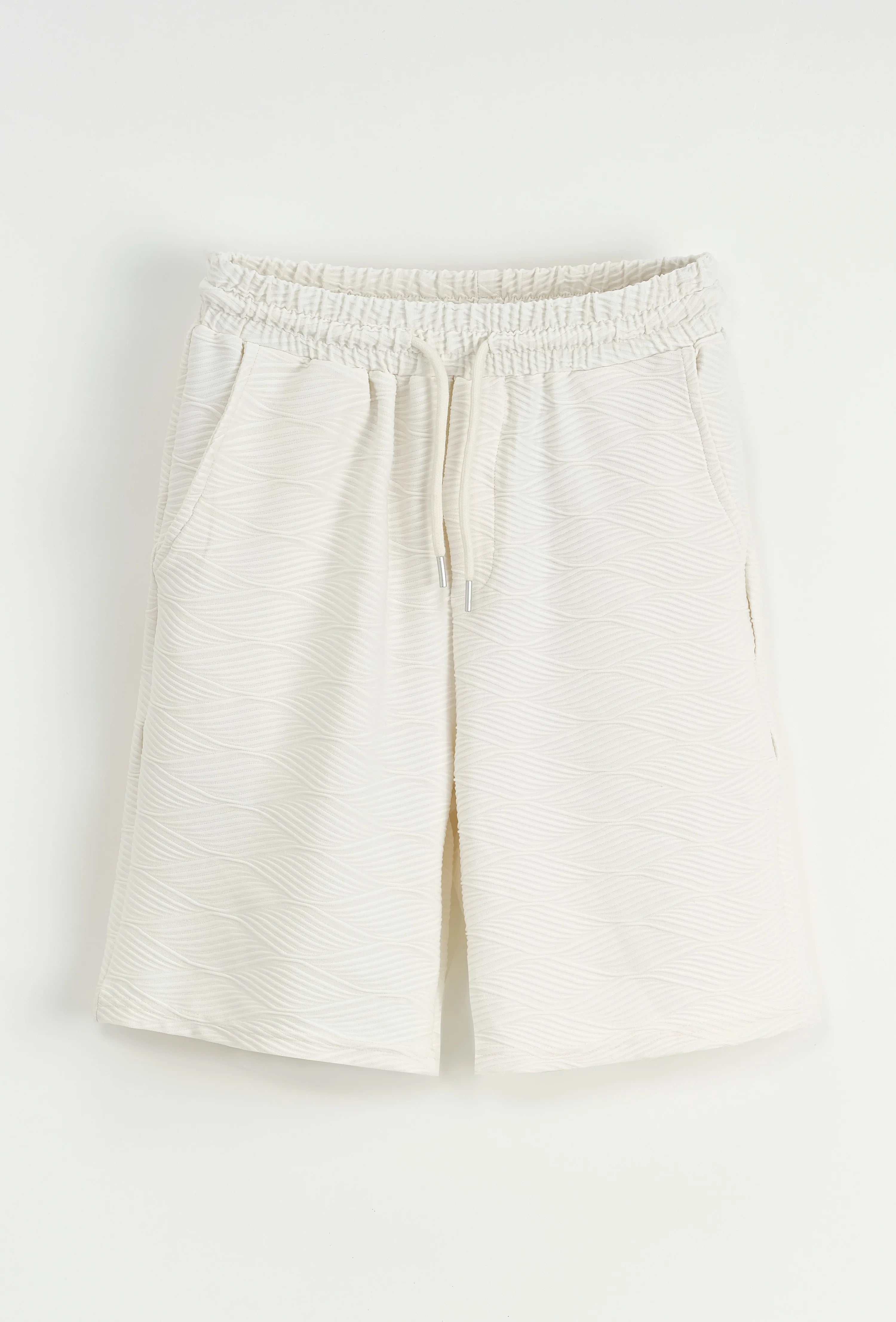 Set van effen shirt en korte broek met patroon