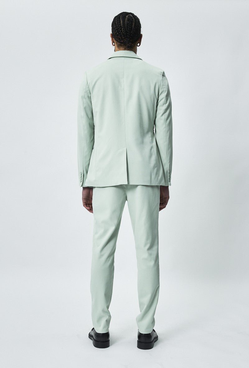 Set met dubbelrijs pak en gestrikte riem